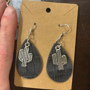 Metal alloy cactus earrings with leather backing